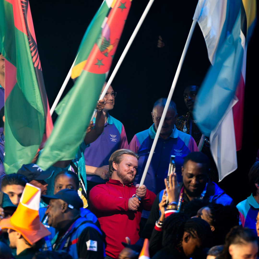 Mark Swan Team England flag bearer at Glasgow 2026 Closing Ceremony